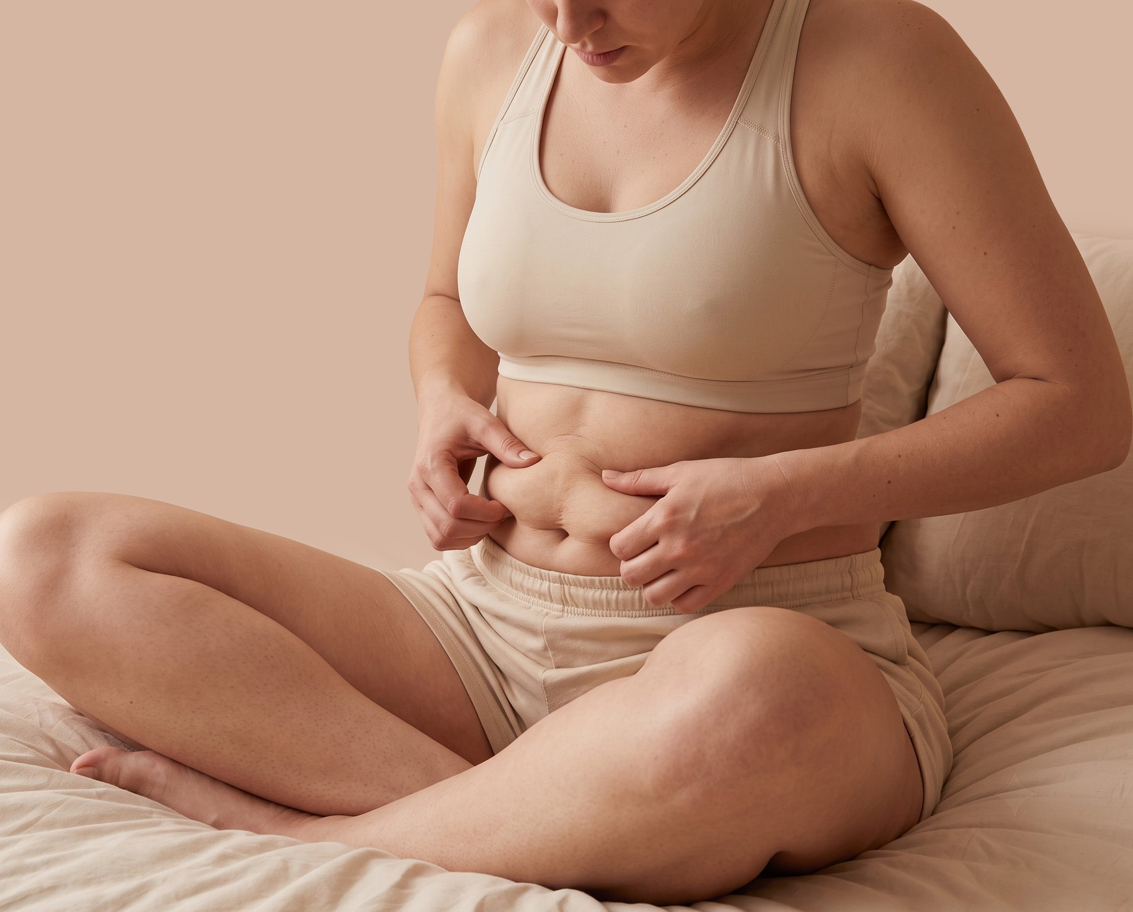 Postpartum woman concerned about body changes and looking for a gentle self-care routine
