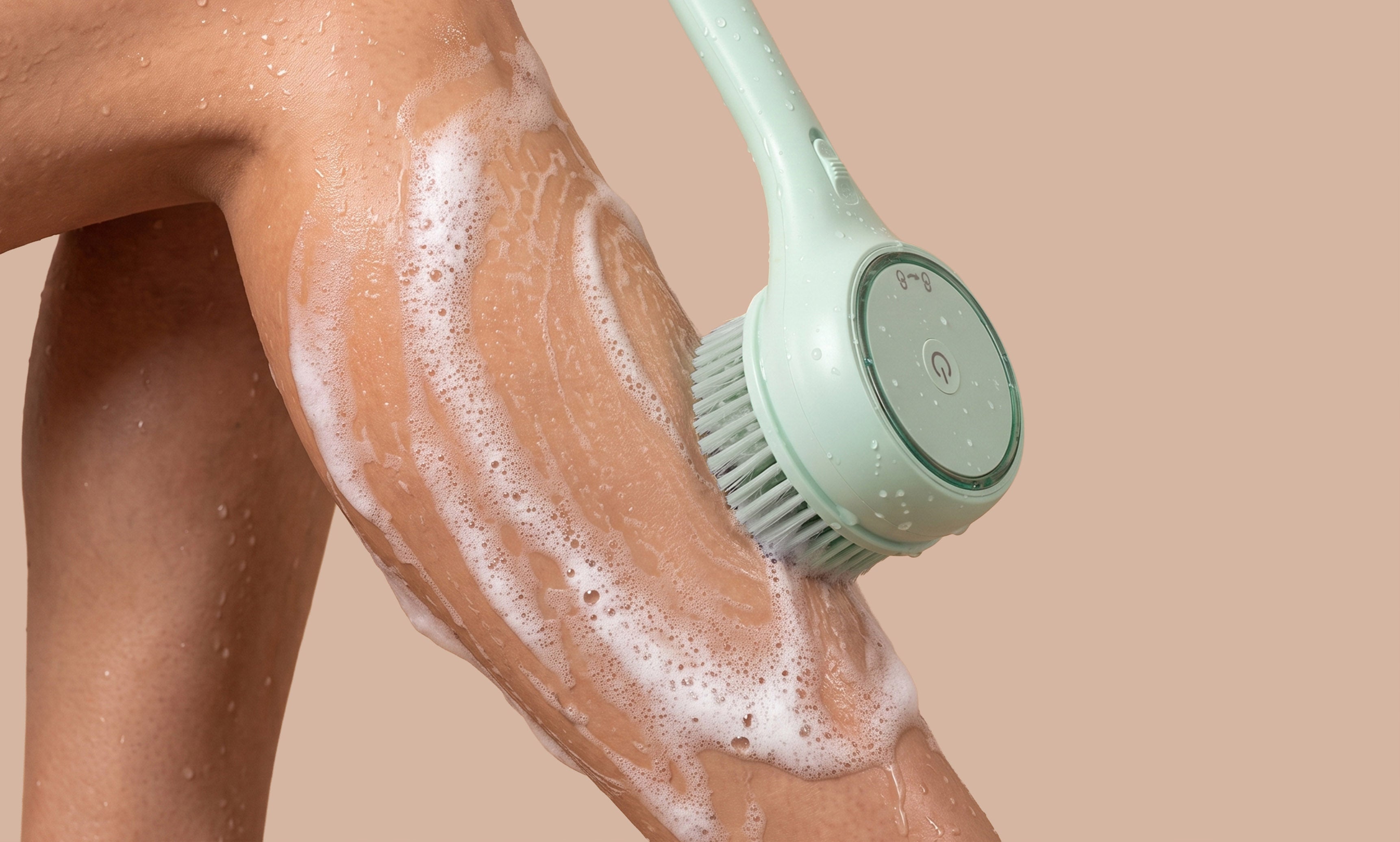 rollerstone electric body brush with lathering bath head for wet shower cleansing